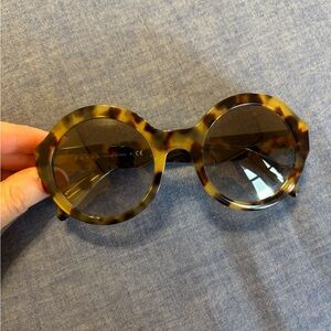 Prada round tortoiseshell sunglasses